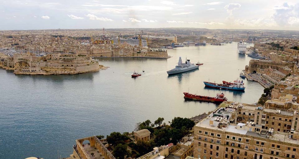 HMS DRAGON departs MALTA. Picture: LA(Phot) Dave Jenkins. HMS DRAGON left the Port of Valletta, Malta after taken part in the Cities Remembrance parade at the Saluting Battery. The ship is the First Type 45 destroyer to visit Malta and whilst alongside the ship was open to visitors.